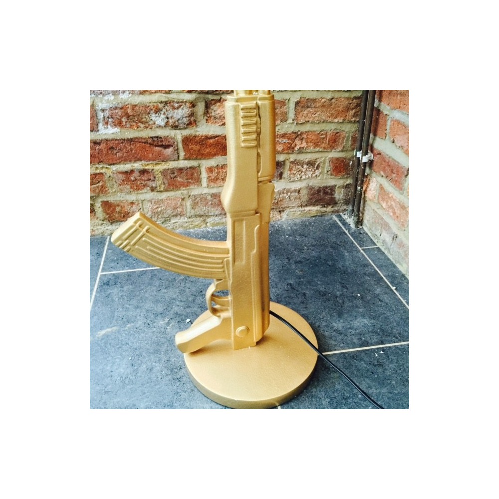 Gold gun Floor Lamp Smithers Archives £223.00      product_features