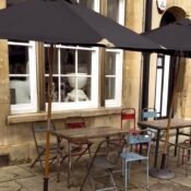 alt=“folding dining table and chairs”