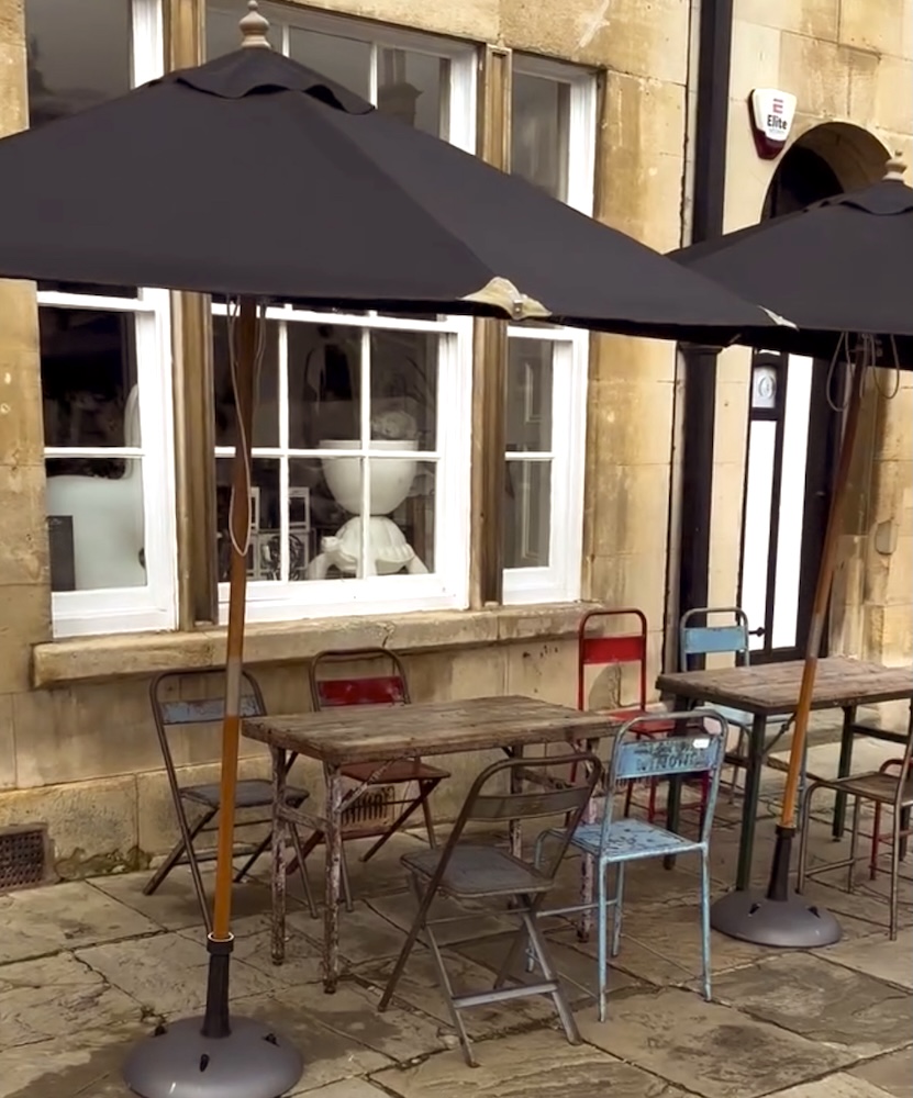 alt=“folding dining table and chairs”