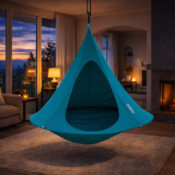 cozy blanket and pillows inside Cacoon hanging chair