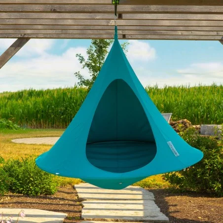hanging Cacoon hanging chair from wooden pergola