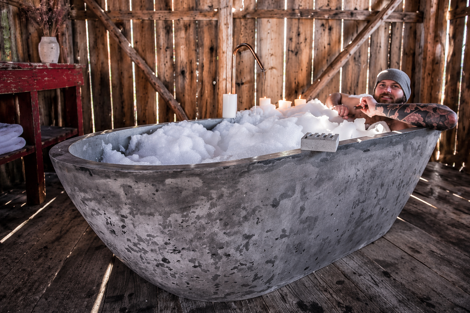 alt="concrete bathtub"
